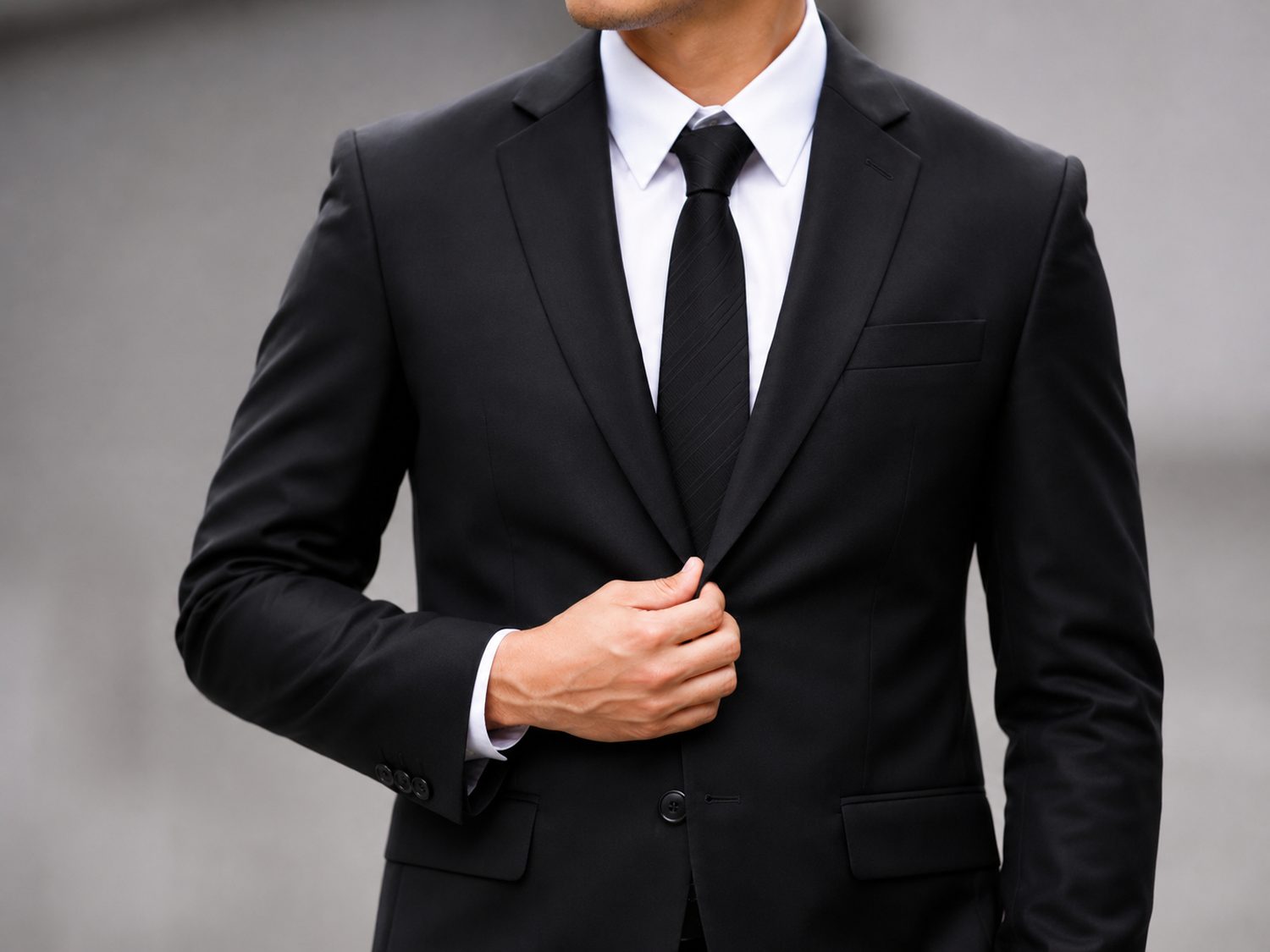 Professional chauffeur in a suit